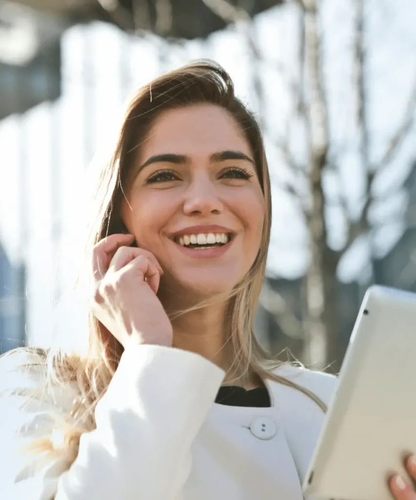 A smiling woman, used for Learn component within Hero (Home)